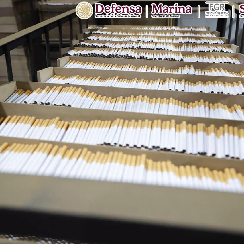 Aseguran 60 toneladas de cigarros falsos y detienen a tres personas en Huixquilucan